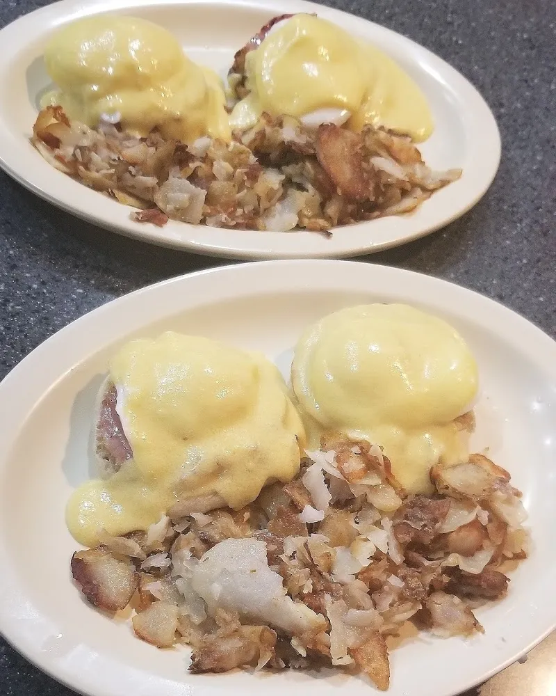 Eggs Benedict Served with Homefries